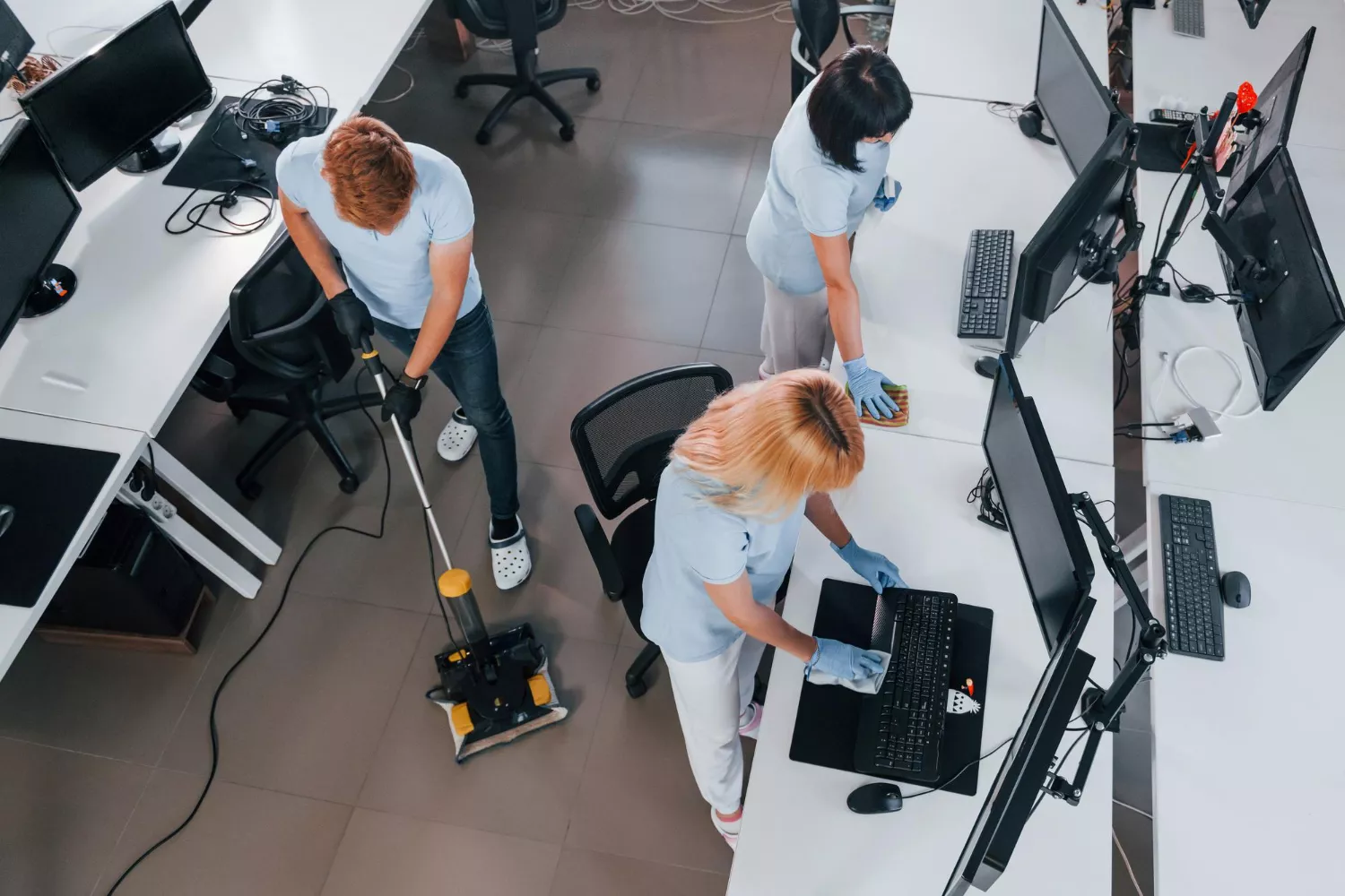 top-view-group-workers-clean-modern-office-together-daytime_08-10-2023